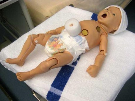 this is a  baby medical dummie being taking care of.